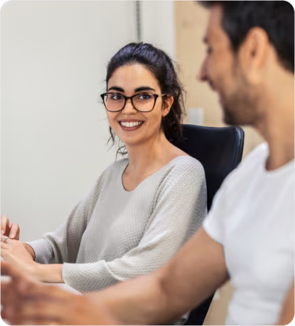 A coach and client in a one-on-one coaching session