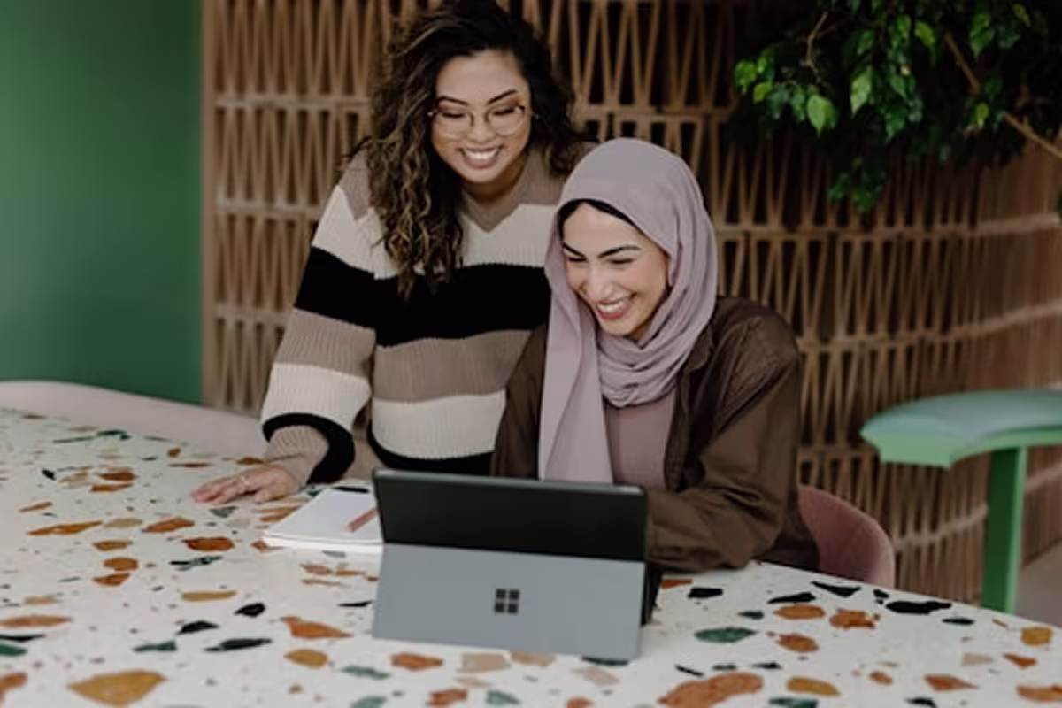 Two professionals collaborating during a coaching session